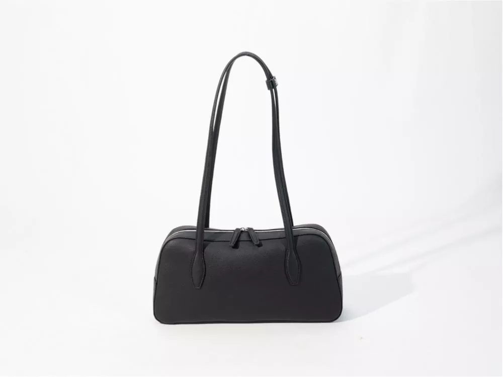 Paano Pumili ng Commuter Underarm Bag? Isang Comprehensive Comparison Guide: PVC vs. PU Materials